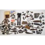 A collection of gun parts including shotgun lock plates, one pair named P Maclagan and one named W&J