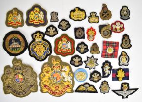 Collection of twenty nine bullion badges including South Wales Borderers, Grenadier Guards,