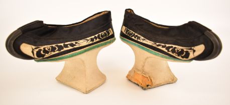 Pair of 19thC Chinese embroidered platform shoes, height 31 x length 21cm
