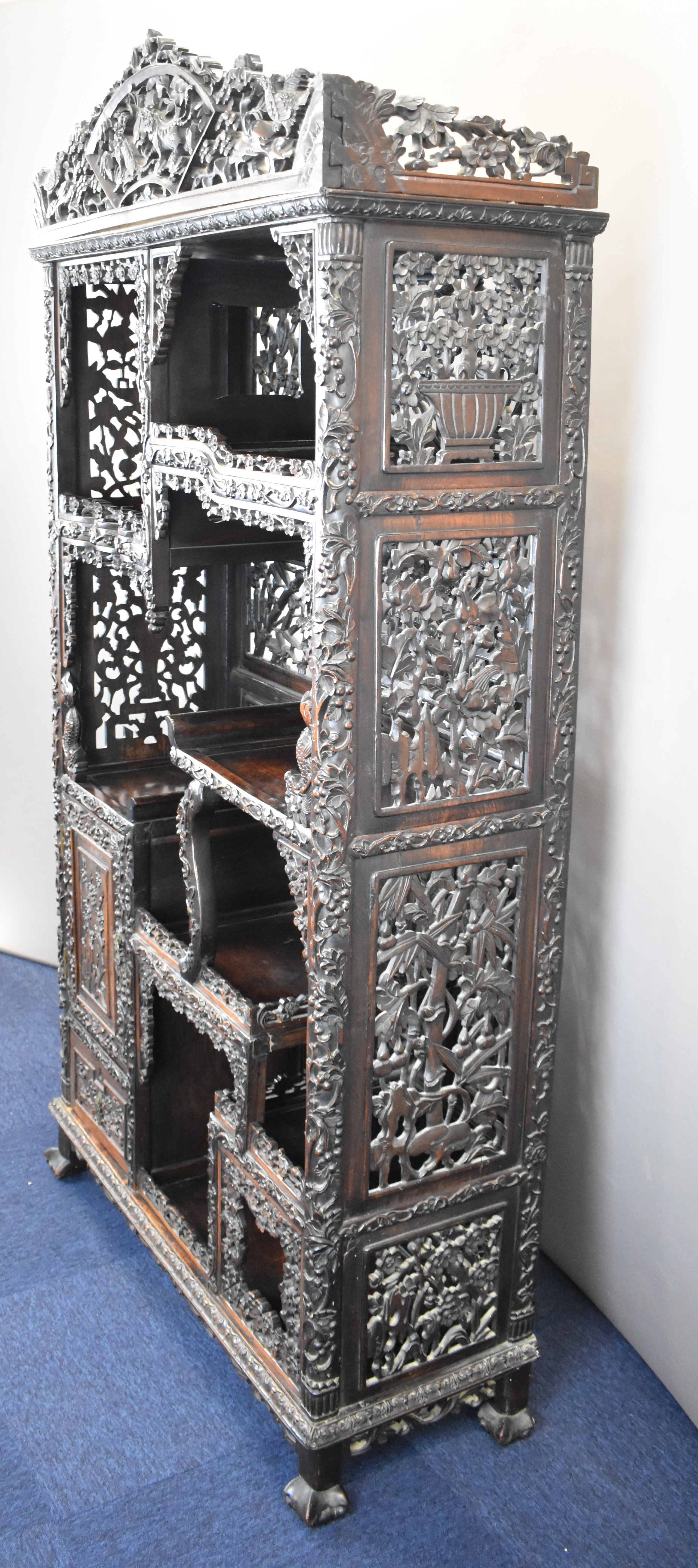 19th / 20thC Chinese carved wood cabinet with an arrangement of tiered and stepped shelves and - Image 15 of 16