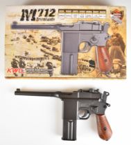 KWC Broomhandle Mauser M712 .177 blowback air pistol with faux wooden grips, serial number 45012156,