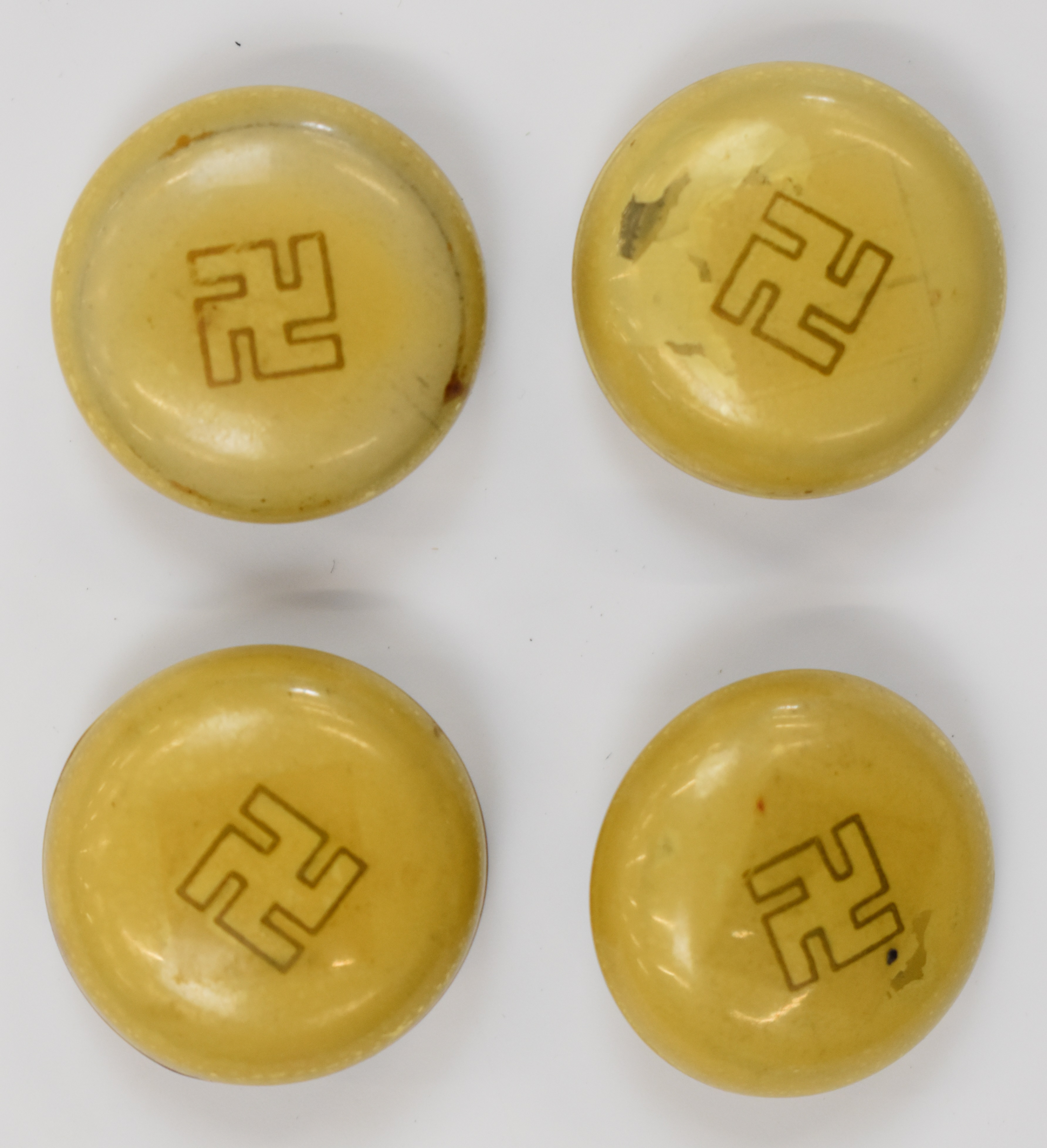 German WW2 Nazi Third Reich set of four plastic / similar buttons with Nazi emblem