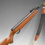 Webley Omega .177 air rifle with chequered semi-pistol grip, raised cheek piece, padded canvas and