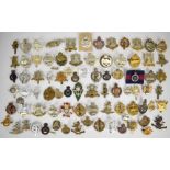 Collection of approximately 70 British Cavalry cap badges including Royal Armourers Corps, Royal