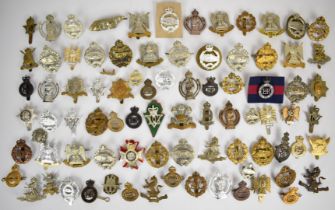 Collection of approximately 70 British Cavalry cap badges including Royal Armourers Corps, Royal