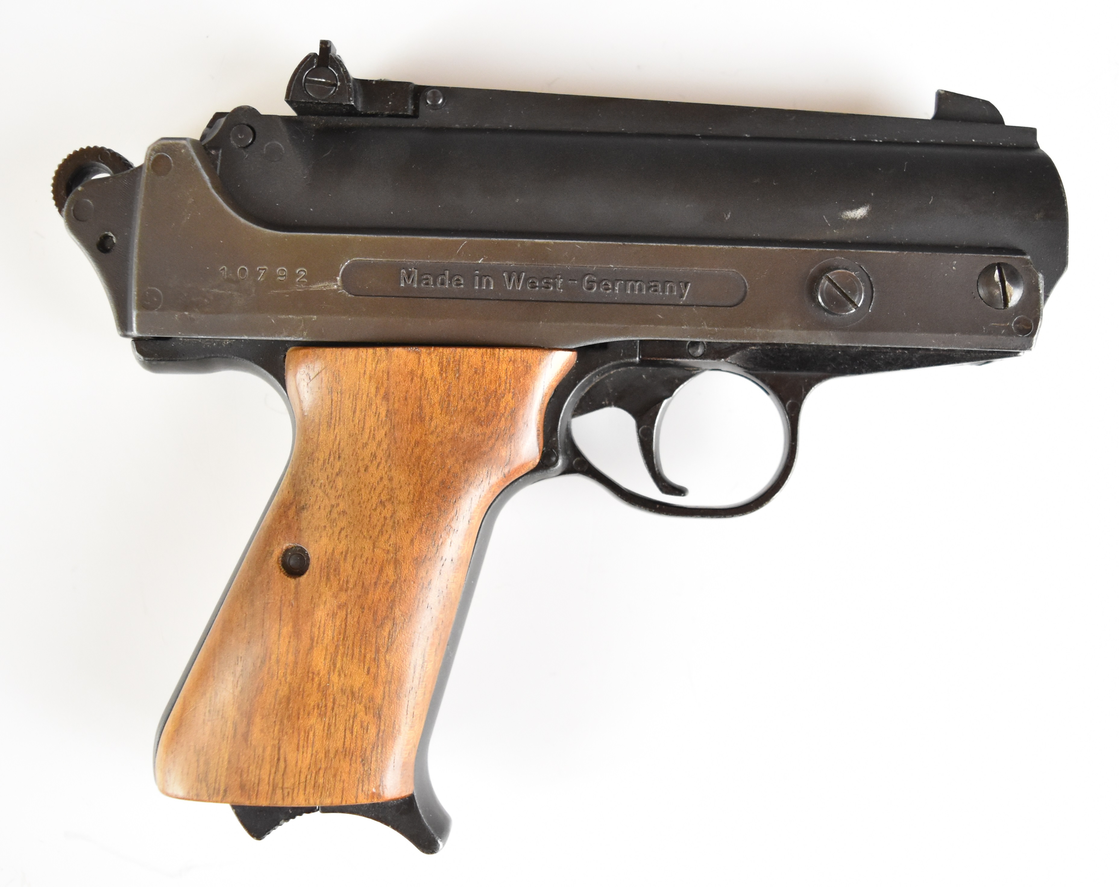 FB Record Jumbo .177 air pistol with shaped wooden grips and adjustable sights, serial number 10792.