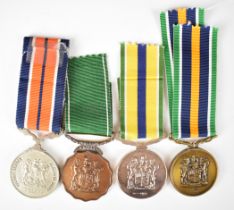 Four South African medals comprising General Service, Good Service and two De Wet examples