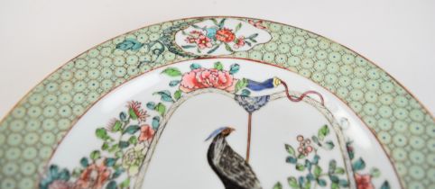 A 19thC Chinese famille verte plate with exotic bird decoration, diameter 22.5cm