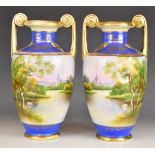 Noritake pair of twin handled pedestal urn shaped vases with pastoral decoration, height 30cm