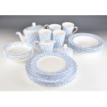 Dior designer porcelain dinner and teaware with Dior motif decoration, approximately 27 pieces,