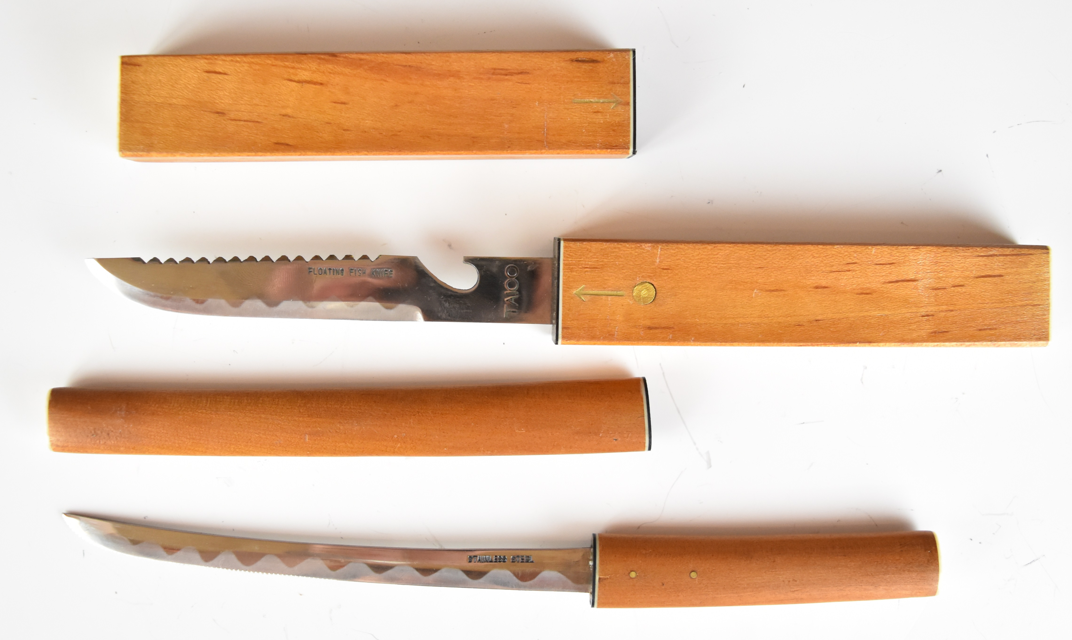 Two Japanese stainless steel fish knives including one Taico Floating Fish Knife, largest 24.5cm
