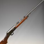 Winchester Model 63 .22 semi-automatic rifle with scope rails, sling mounts, semi-pistol grip, sound