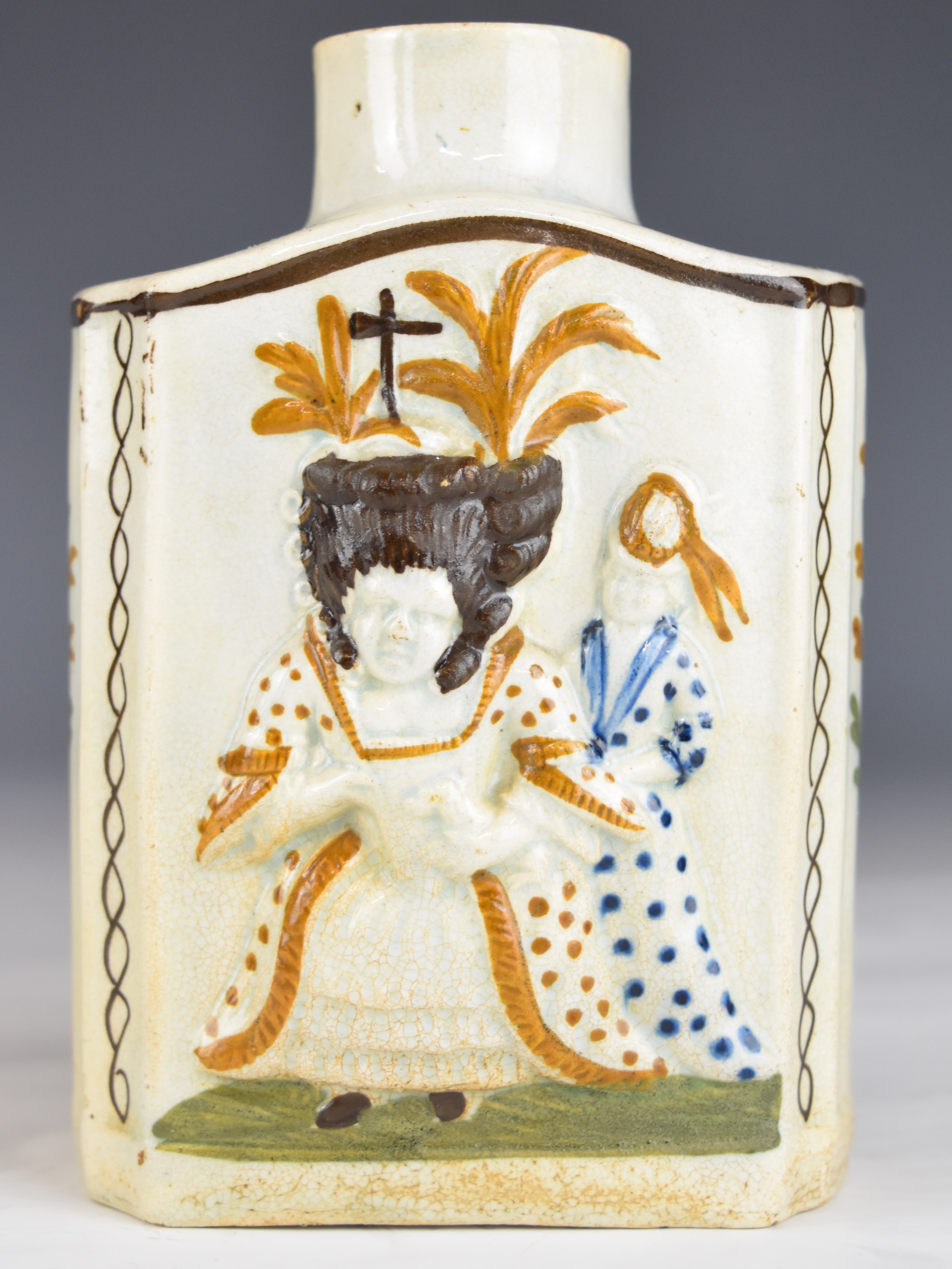 A late 18thC Prattware tea caddy with relief decoration of figures, probably King George III and - Image 2 of 5