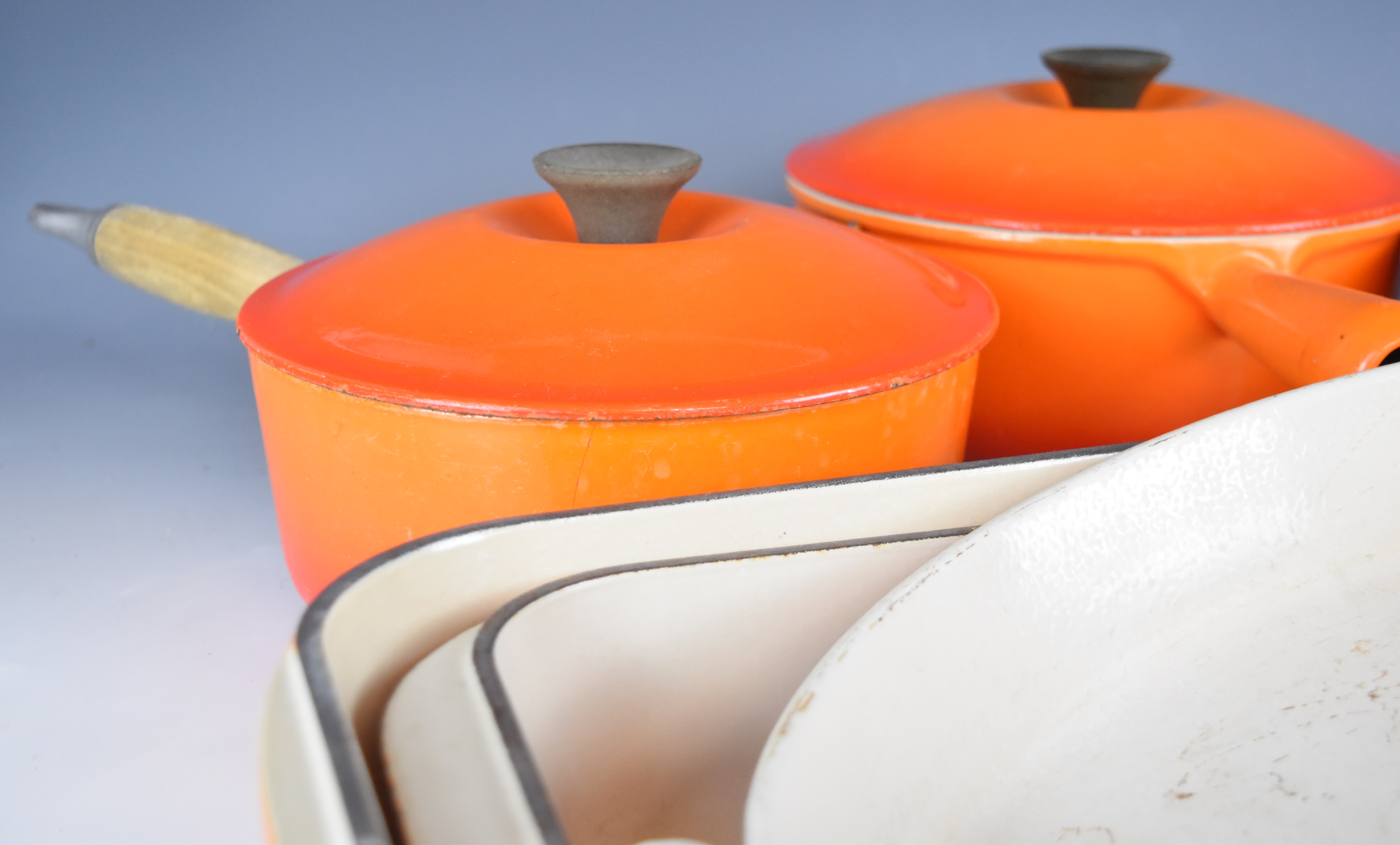 Ten items of Le Creuset cast iron cook ware in Volcanic Orange, to include lidded saucepans, milk - Image 2 of 8