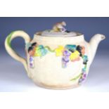 Chinese pottery teapot in Yixing style with applied leaf and vine decoration in enamels with mouse