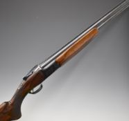 Miroku 12 bore over and under ejector shotgun with engraved locks, chequered semi-pistol grip and