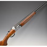 Beretta Model S687 12 bore over and under ejector shotgun with engraved scenes of birds to the locks