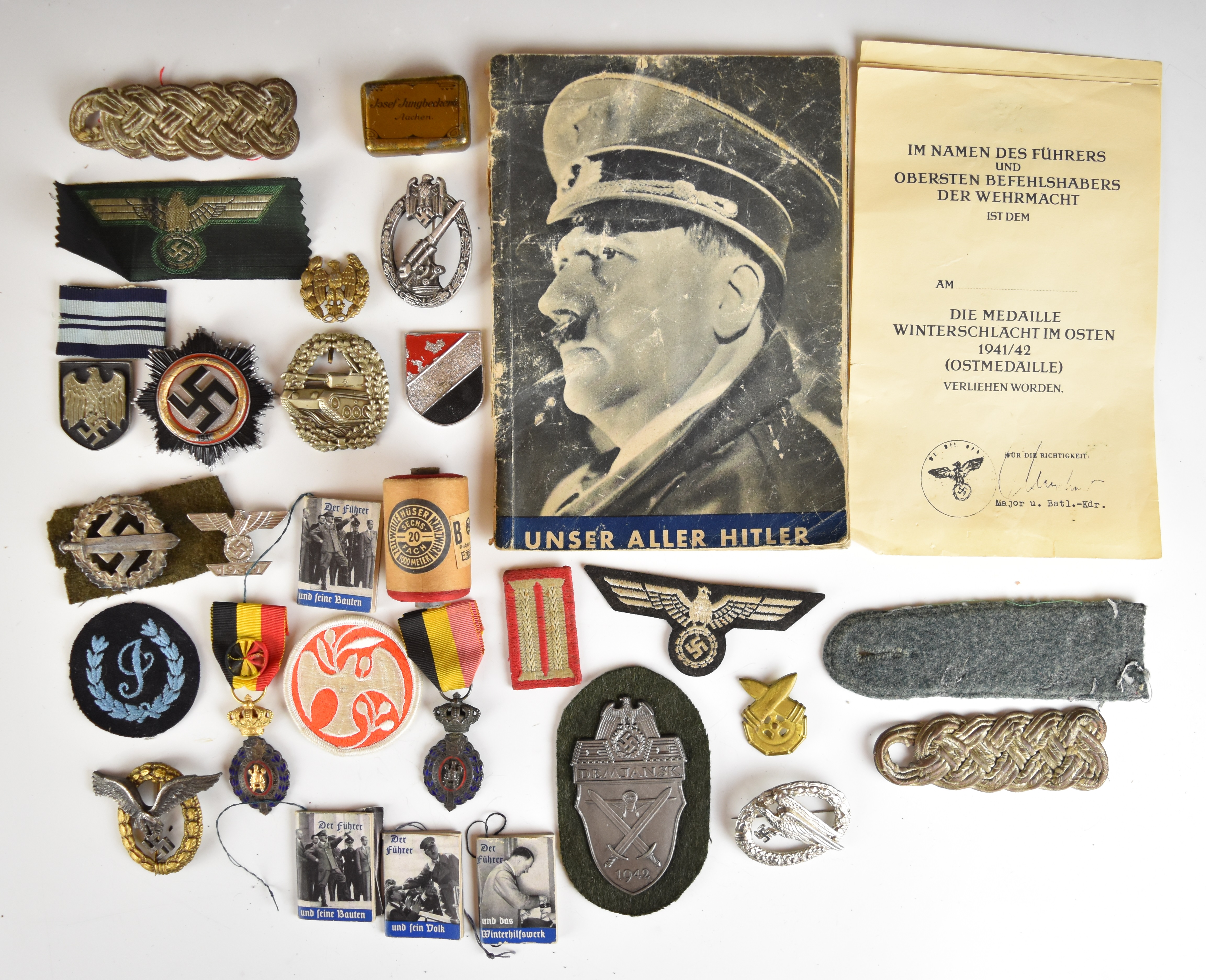Mainly reproduction German WW2 Nazi insignia, booklets etc - Image 9 of 16