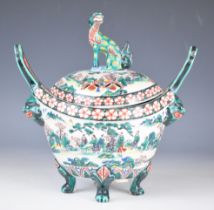 Chinese twin handled and footed pot pourri with figural decoration and Dog of Fo finial, height 22.