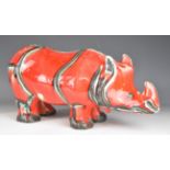 David Sharp, Rye Pottery red rhino, signed to base, length 43cm