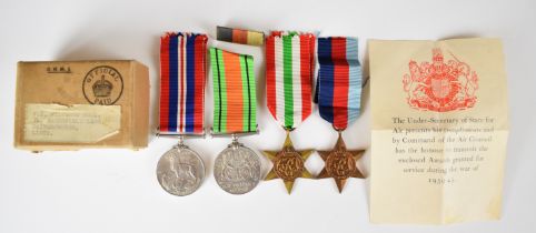 WW2 medals comprising 1939/1945 Star, Italy Star, Defence Medal and War Medal with postal box to F E