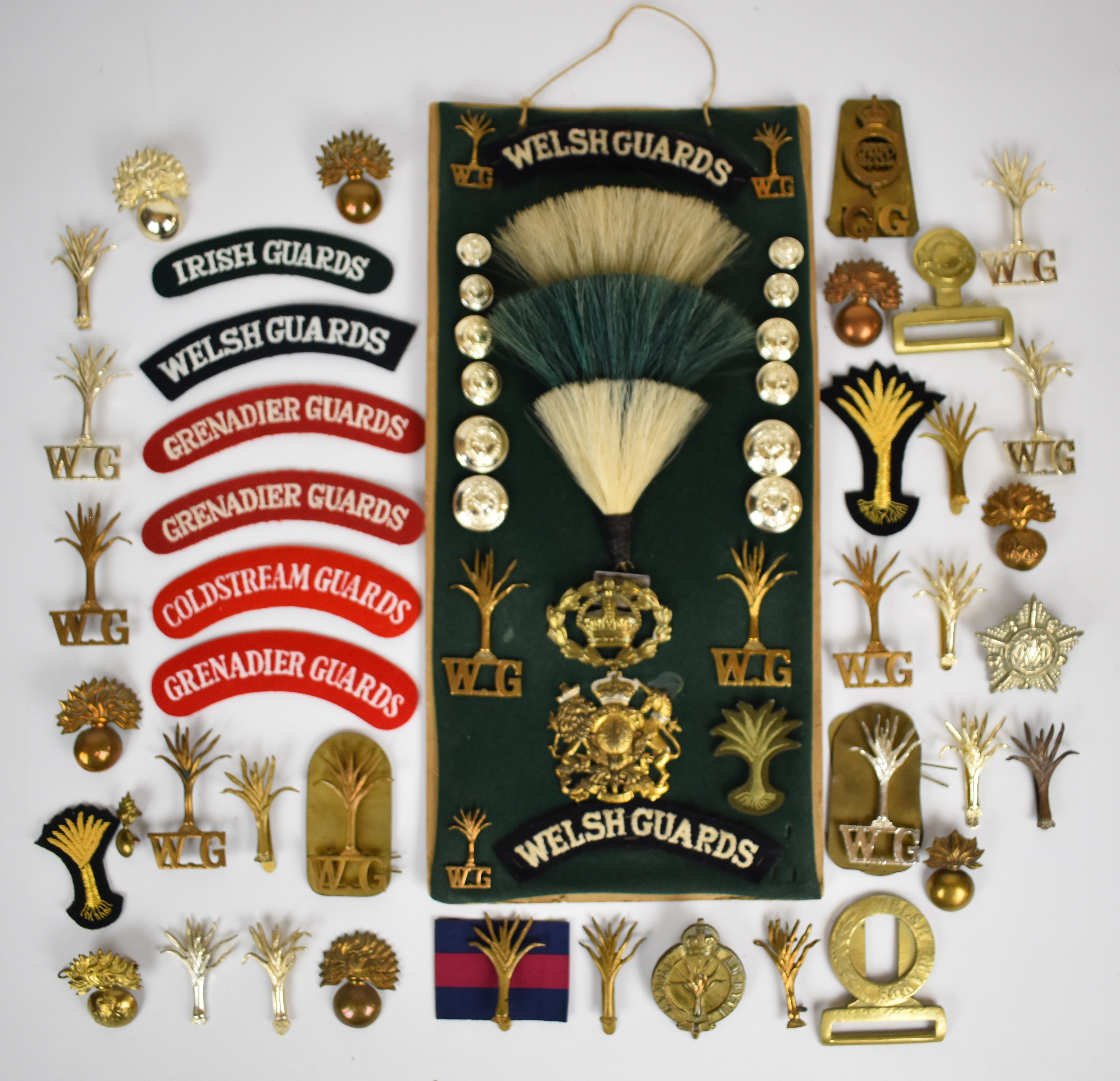 Collection of approximately 30 Grenadier and Welsh Guards badges including cap badges, shoulder
