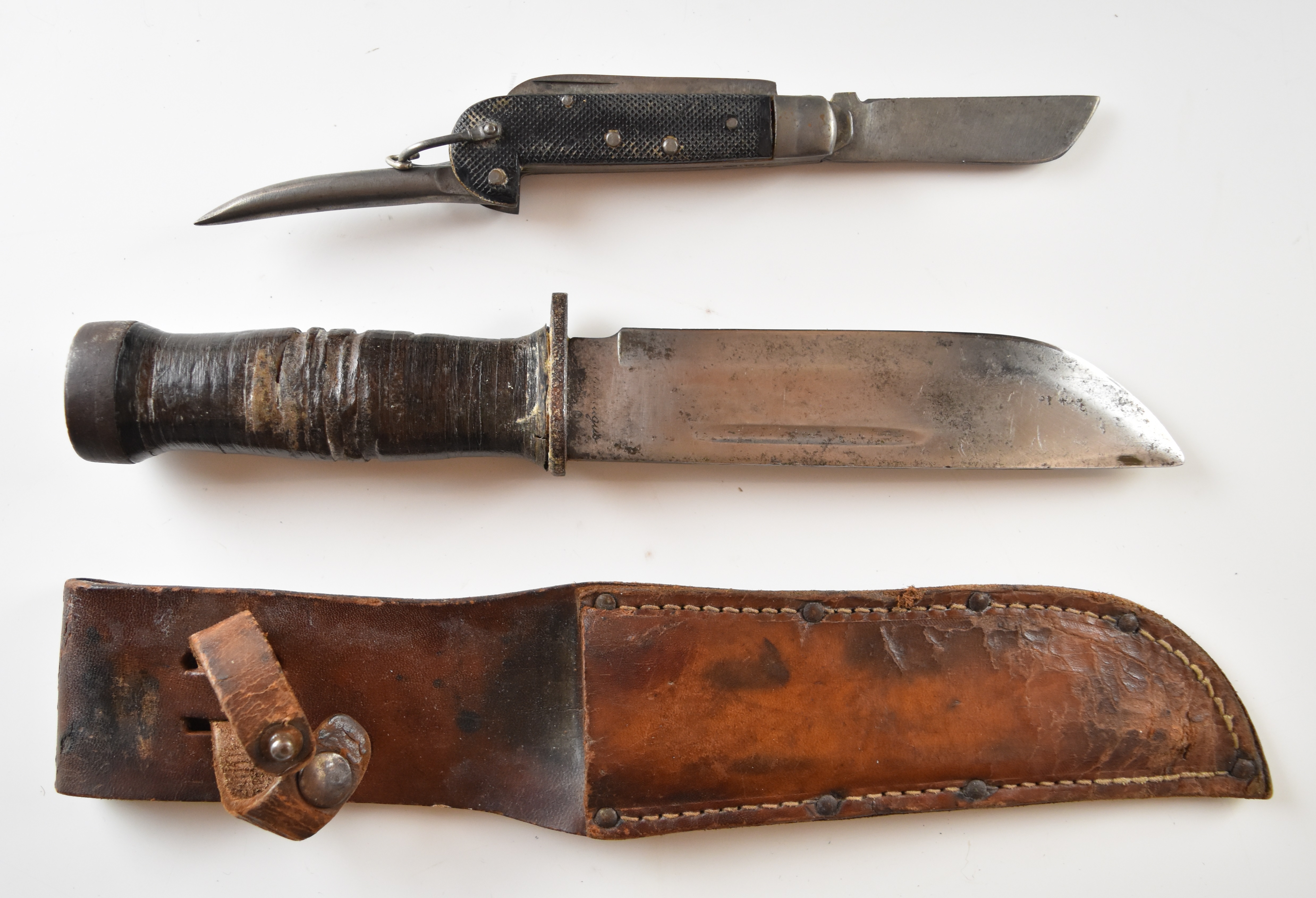 Hunting knife with leather grip, 15.5cm single edged blade and leather sheath, together with
