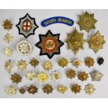 Collection of approximately 30 badges for the Scots Guards and Irish Guards including cap badges,