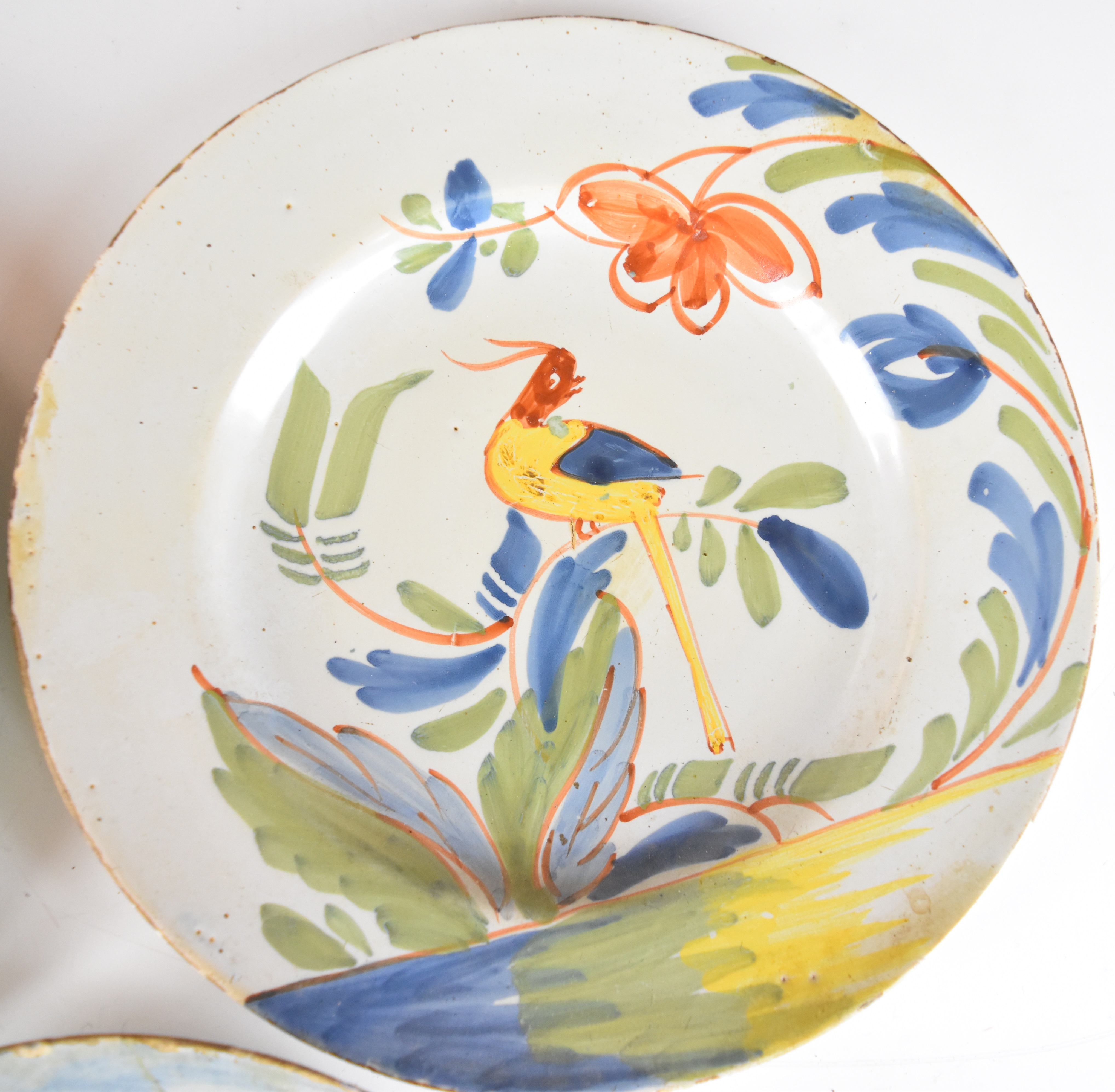 Three 18thC Delft plates including a polychrome example with exotic bird decoration, largest - Image 2 of 10