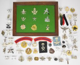 Collection of approximately 50 British Army Gurkha Regiment badges including Transport Regiment,
