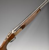 Lanber 12 bore over and under ejector shotgun with engraved scenes of birds to the locks and