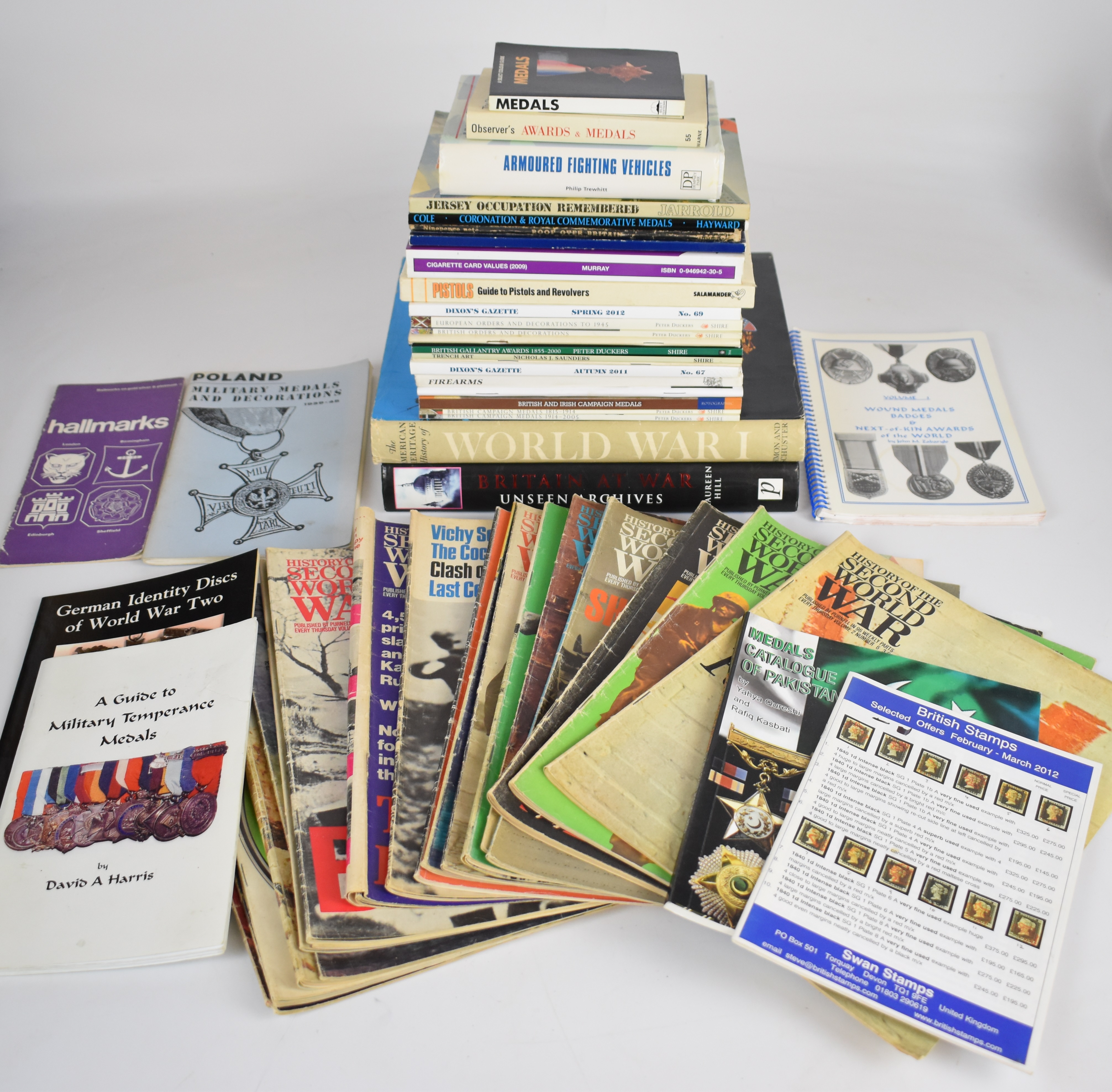 Collection of approximately 40 military reference books and magazines including German Identity