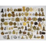 Collection of approximately 80 British Corps and other cap badges including Army Pay Corps,