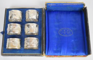 Six Chinese vintage / antique silver napkin rings, in box