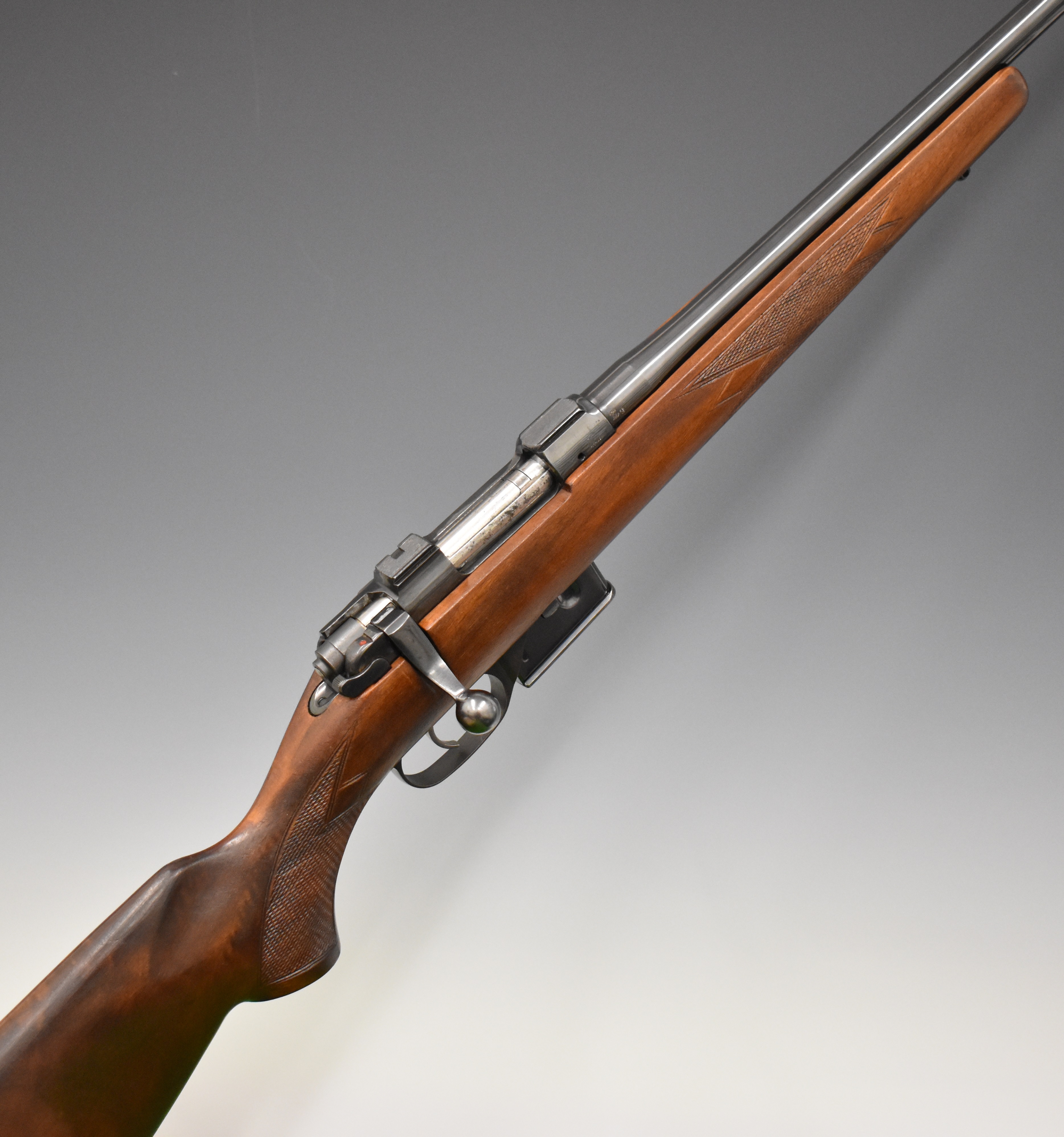 CZ 527 American .222 Remington bolt-action rifle with chequered semi-pistol grip and forend, sling