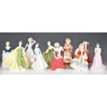 Ten Royal Doulton figurines including Old Country Roses, Midinette, Noelle and Christmas Morn,