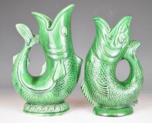 Two Dartmouth pottery figural fish gurgle / glug jugs, tallest 18cm