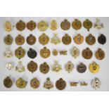 Collection of approximately 40 Royal Engineers cap badges including officer's silvered and gilt,