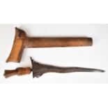 Kris dagger with carved wood pommel in shape of bird's head, 26cm part wavy double edged blade and