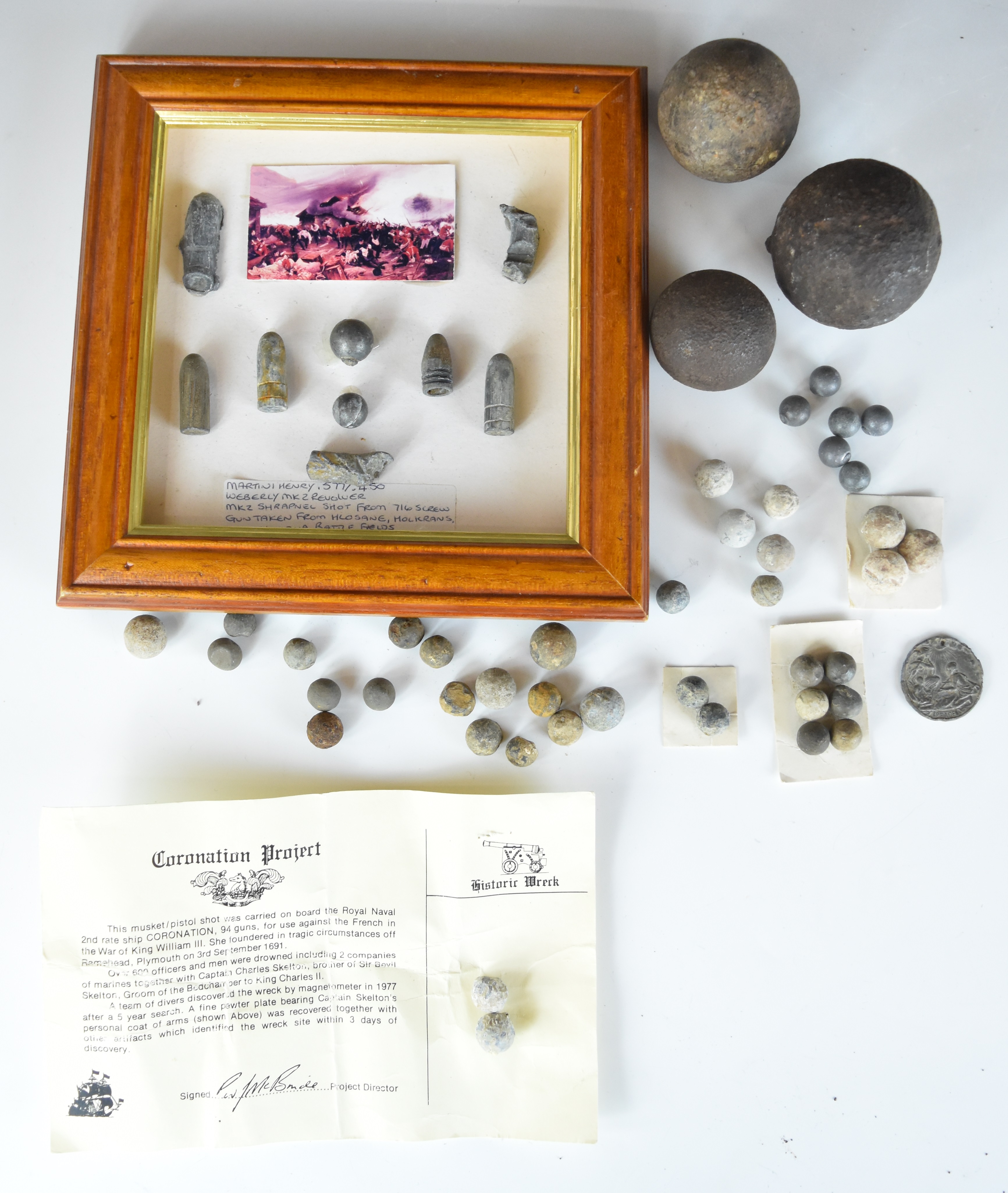 Small collection of musket and cannon balls including a mounted display of nine items with