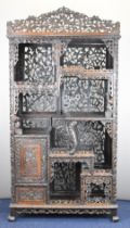 19th / 20thC Chinese carved wood cabinet with an arrangement of tiered and stepped shelves and