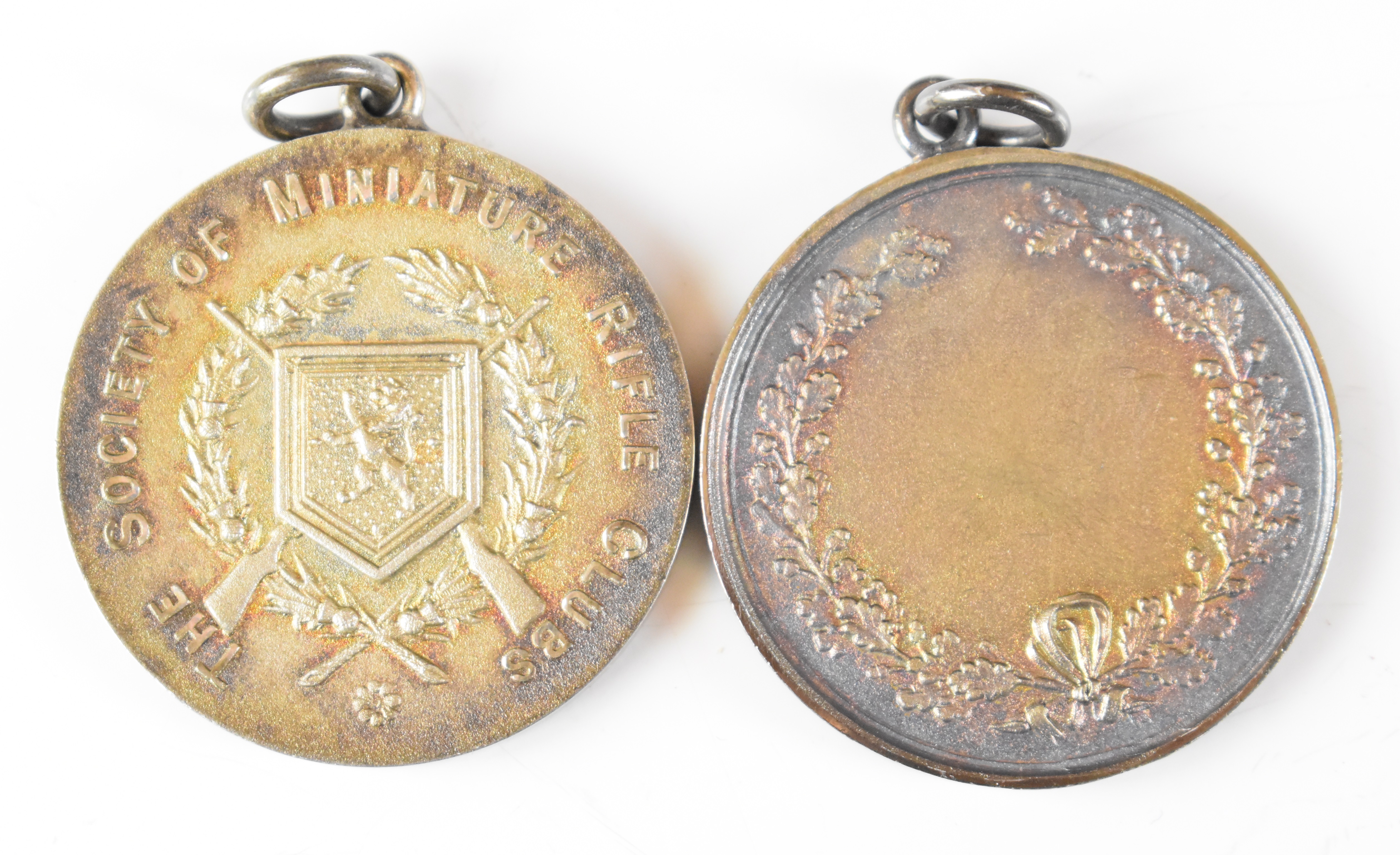 Eight Society of Miniature Rifle Clubs medals comprising two hallmarked silver examples (one - Image 2 of 8