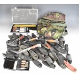 A collection of gun accessories including Midwater PCP cylinder carry bag, recoil pads, shotgun