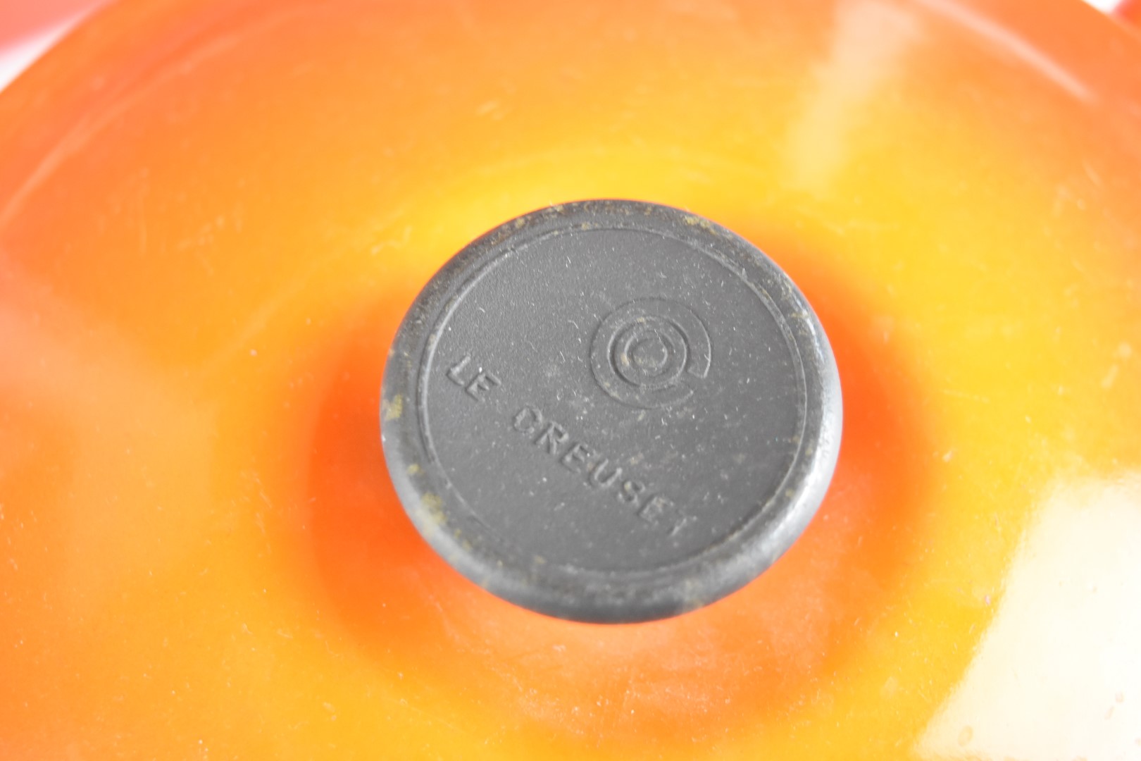 Ten items of Le Creuset cast iron cook ware in Volcanic Orange, to include lidded saucepans, milk - Image 5 of 8
