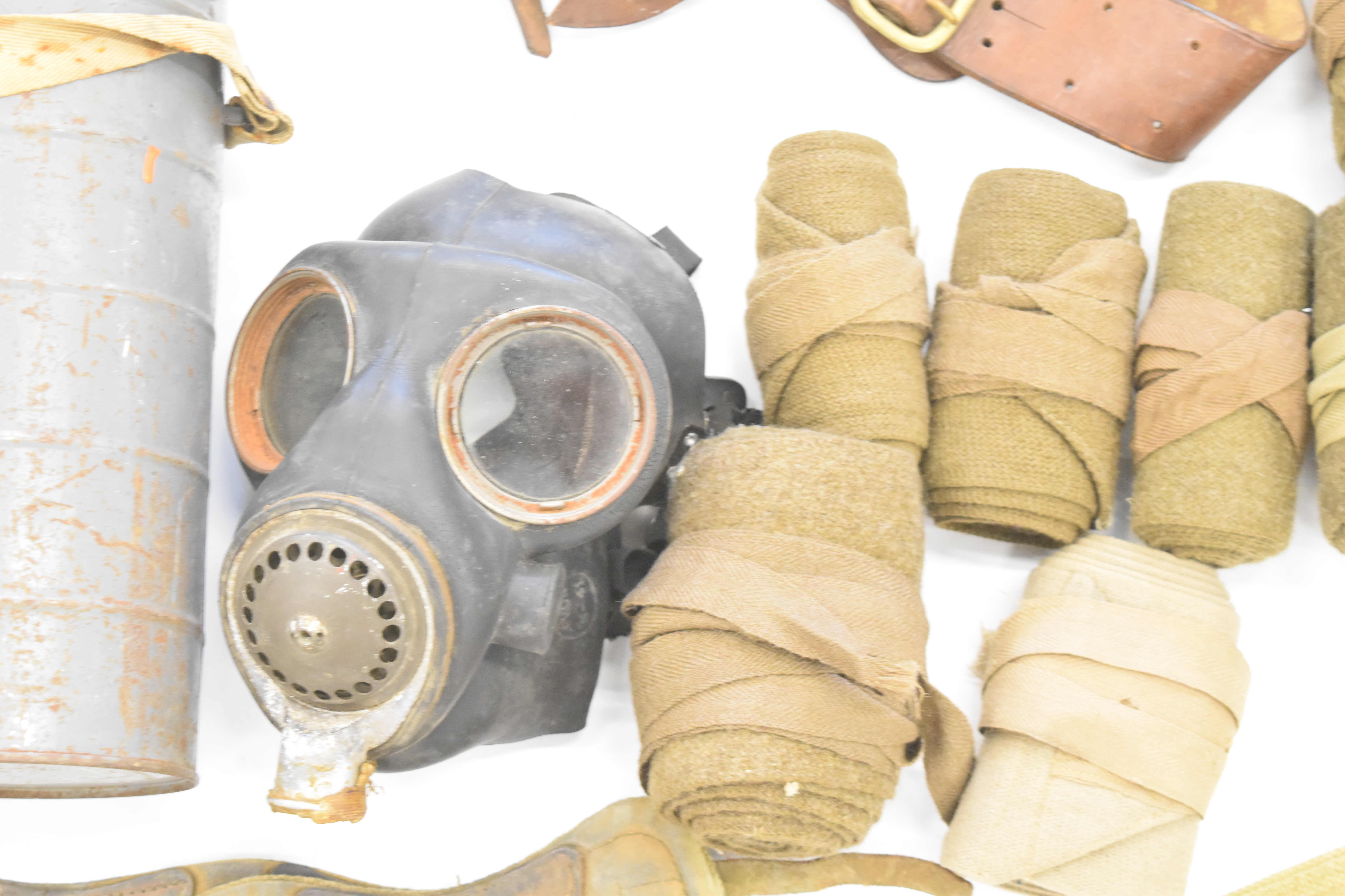 Military equipment including French respirator / gas mask in tin, Sam Browne belt, battle dress - Image 3 of 7
