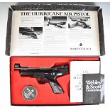 Webley Hurricane .22 target air pistol with shaped and chequered grips and adjustable sights,