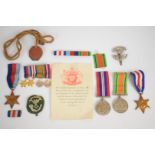 British Army WW2 group of four comprising 1939/1945 Star, France & Germany Star, Defence Medal and