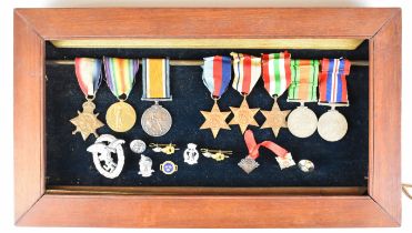 British WW1 and WW2 father and son medal groups comprising 1914/1915 Star, War Medal and Victory