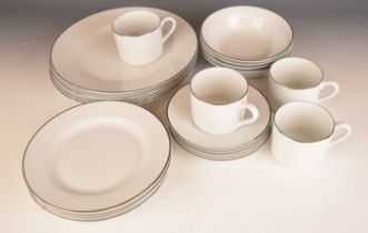 Royal Worcester four place setting dinner and tea ware decorated in the Classic Platinum pattern,