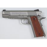 Swiss Arms SA 1911 .177 CO2 air pistol with chequered faux wooden grips, multi-shot magazine and